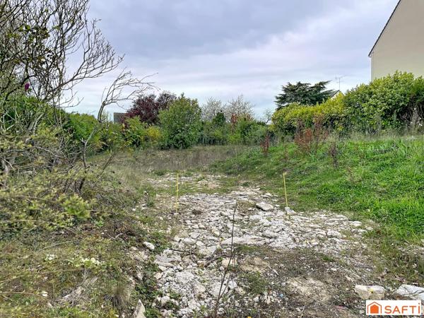 Terrain en 2 lots de 462 m2 chacun - REC C - proche commerces - écoles - quartier résidentiel