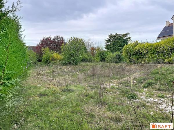 Terrain en 2 lots de 462 m2 chacun - REC C - proche commerces - écoles - quartier résidentiel