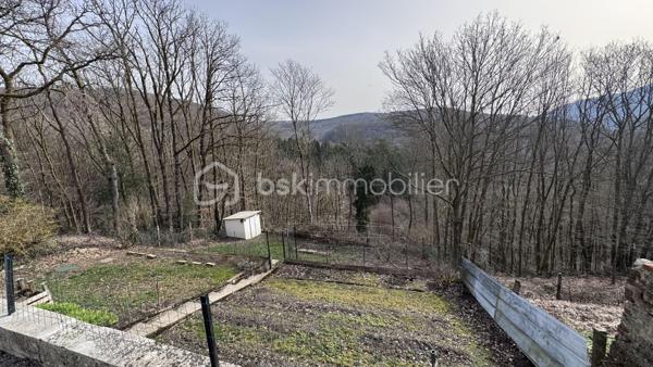 🏘️ Maison familiale avec vue exceptionnelle et dépendances 🏘️ 

🌳🌳Dans un cadre calme et verdoyant, découvrez cette maison de caractère de 180 m²🌳🌳 

👉🏿Dès l'entrée nous serons charmés par:

-Salon / salle à manger avec poêle à bois 11 kW
-Cuisine équipée
-Petit salon ou coin bureau avec poêle à pellets
-Buanderie
-Dressing
-Salle de douche
-WC 

👉🏿Au 1er étage:

-Chambre avec rangements (16m²)
-Une suite parentale comprenant un grand dressing et salle de bain (20m²)

👉🏿Au second étage:

- 2 chambres (16 m² et 20 m²)


➕Dépendances et extérieurs:

-salle de musique 50 m² chauffée avec panneaux solaires pouvant être transformée en Airbnb pour un complément de revenus non négligeable
-atelier + scierie équipée
-caves avec puits et pompe alimentant plusieurs équipements
-terrasse aménagée avec barbecue
-parking avec carport photovoltaïque

🪴🌳Ce n'est pas fini, découvrez encore 🌳🪴

-verger de 350 m²
-bois de 600 m²
-plusieurs coins jardins
-abri en béton
-surface totale du terrain comprenant la maison 3006 m²

🔥Les plus qui font la différence 🔥

-toiture récente
-marquise fait main
-pompe à chaleur + poêles
-réserve de bois
-fenêtres anti-bruit PVC

Multiples possibilités pour cette jolie demeure tel que:
-chambres d'hôtes
-airbnb
-projets touristique 
✅DPE C

📞 Contactez moi pour une visite 06.61.83.67.94 📞