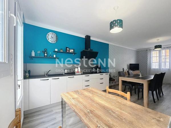 Maison de ville avec garage et jardin