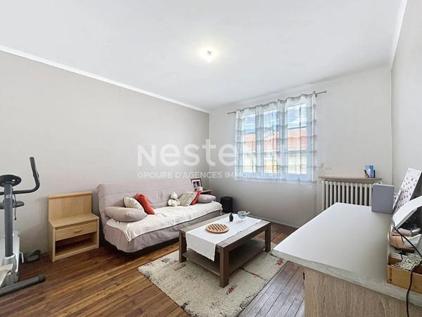 Maison de ville avec garage et jardin