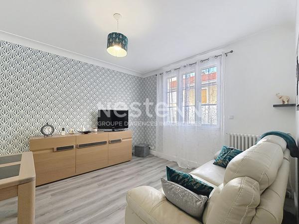 Maison de ville avec garage et jardin