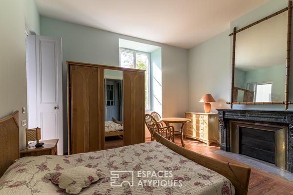 Grand appartement rénové dans un ancien moulinage avec jardin et parking – au centre ville