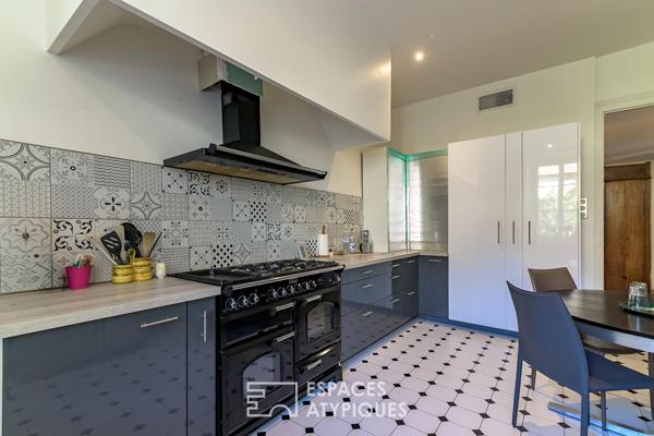 Grand appartement rénové dans un ancien moulinage avec jardin et parking – au centre ville