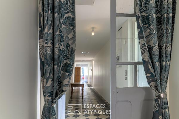 Grand appartement rénové dans un ancien moulinage avec jardin et parking – au centre ville