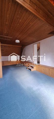 Maison avec garage et jardin à fort potentiel