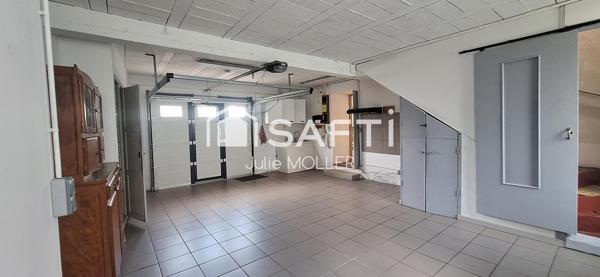 Maison avec garage et jardin à fort potentiel