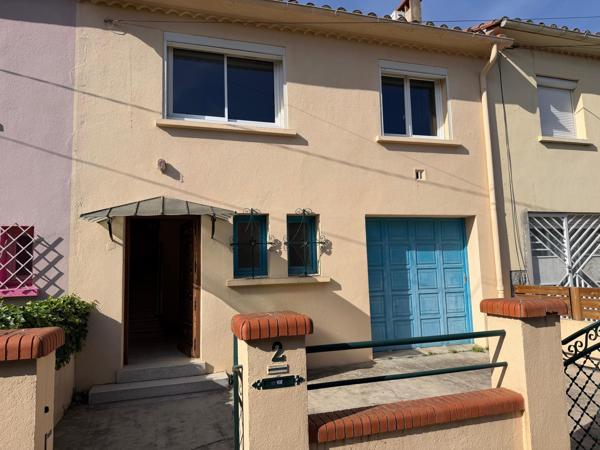 Maison avec garage et jardin au calme