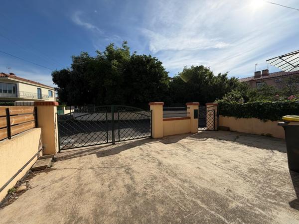 Maison avec garage et jardin au calme