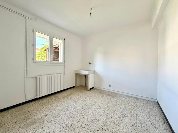 Maison avec garage et jardin au calme
