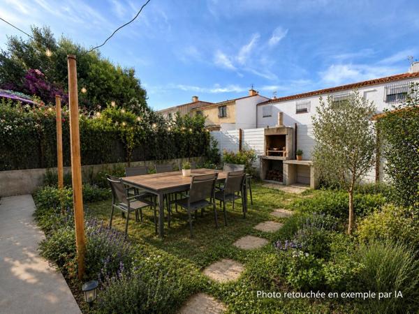 Maison avec garage et jardin au calme