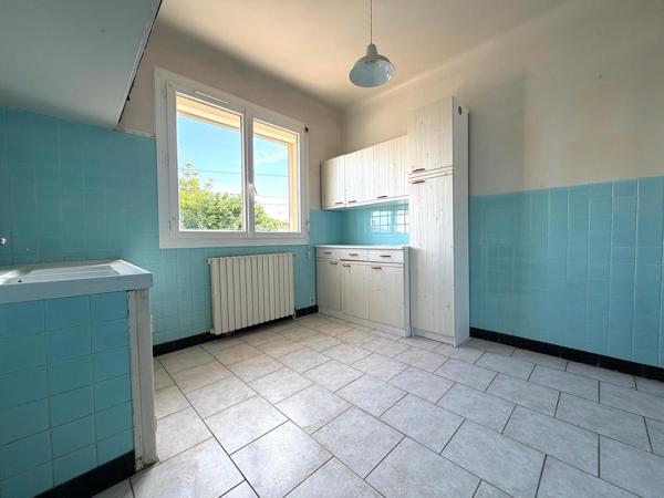 Maison avec garage et jardin au calme