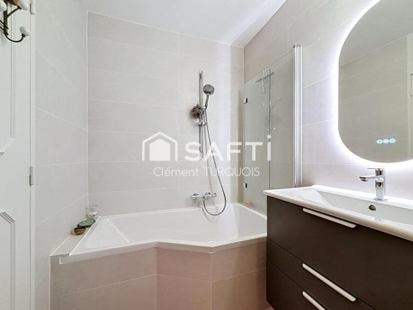 Appartement 85 m² rénovation de qualité proche commerces