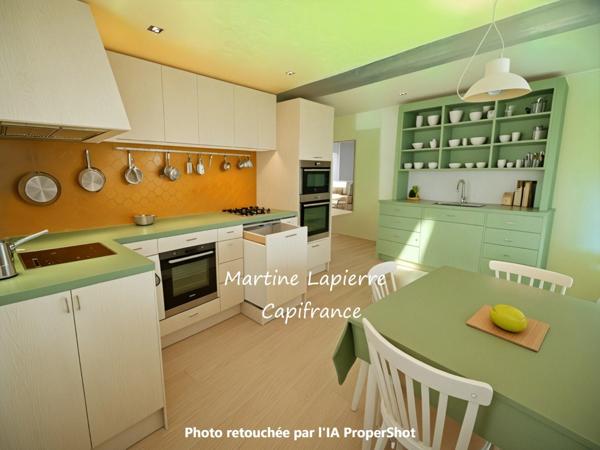 Au coeur du village, charmante maison avec jardin clos