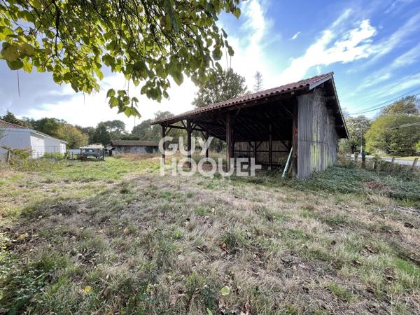 Terrain de 1608m² avec grange et hangar