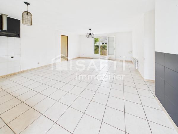 Maison de plain-pied, jardin, proche du centre.