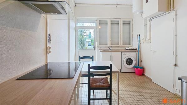 2 Appartements avec jardin privatif + 2 locaux commerciaux