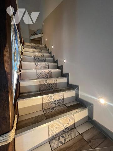 Pavillon récent de 2020, de type 5 pièces, d'une superficie de 91.25 m², édifié sur un terrain 