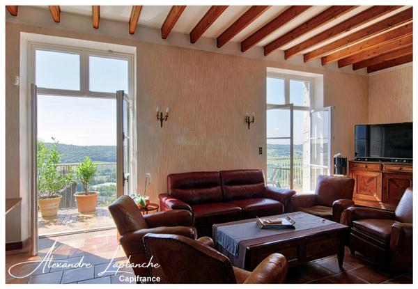 Dpt Tarn et Garonne (82), à vendre LAUZERTE maison de ville en pierre 9 pièces de 205m² avec jardin et garage.