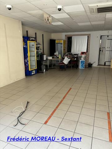 Immeuble en plein centre ville avec local commercial et appartement T2 + Jardin au calme