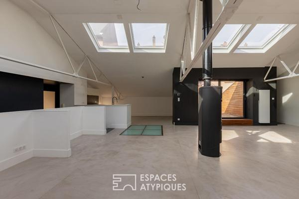 Loft dans un ancien atelier d’architecte et sa terrasse en coeur de ville