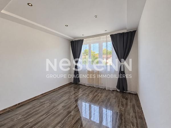 Appartement 4 pièces 76m² - Avec balcon, caves et garage !