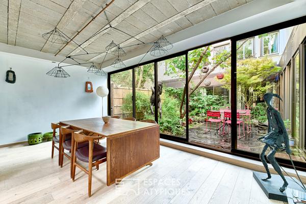 Appartement loft d’exception avec jardin – Quartier Trudaine