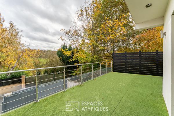 Maison d’architecte avec terrasse et jardin