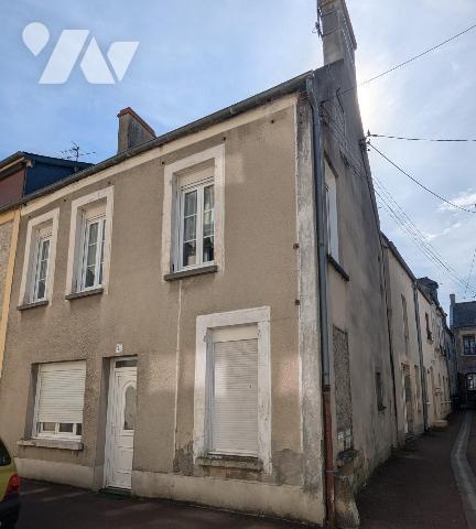 Immeuble comprenant deux appartements dont un loué