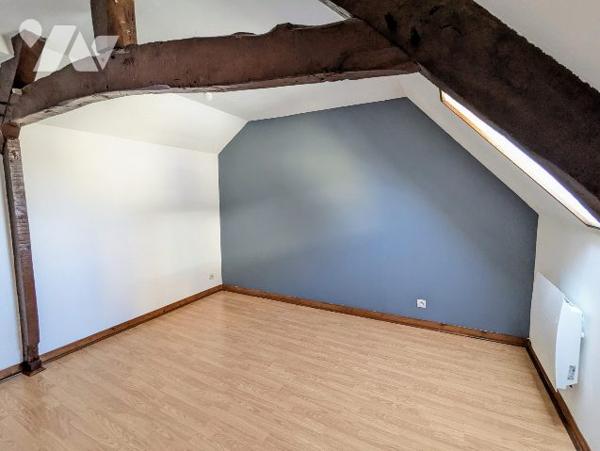 Immeuble comprenant deux appartements dont un loué