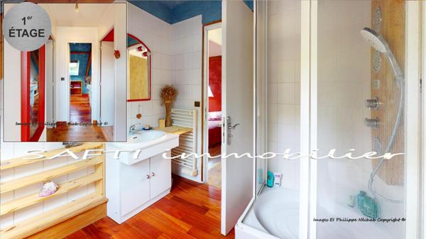 Maison individuelle non mitoyenne de 115m2 habitables - 3/4 chambres - sous-sol total sur 1446m2 de terrain entièrement arboré et paysagé .