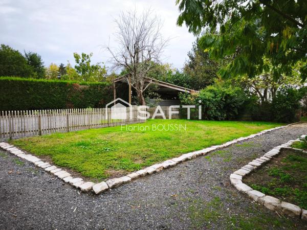 Maison en pierre de Tuffeau et jardin idéalement exposé