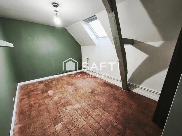 Maison en pierre de Tuffeau et jardin idéalement exposé