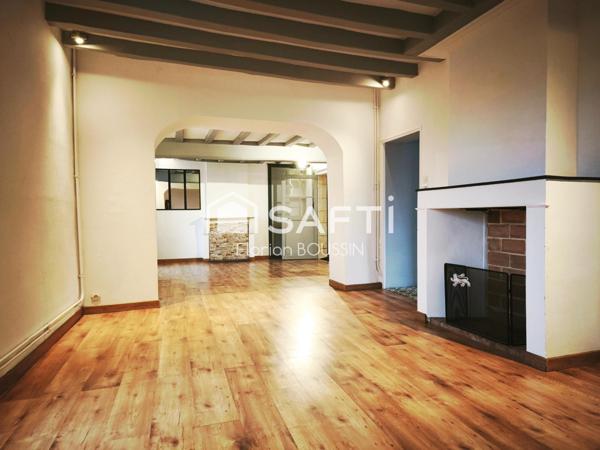 Maison en pierre de Tuffeau et jardin idéalement exposé