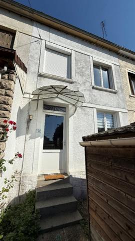 Maison de ville beau potentiel