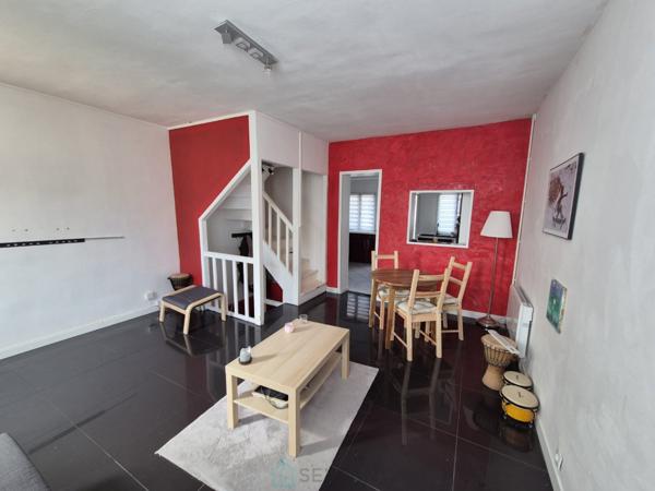 Maison de ville beau potentiel