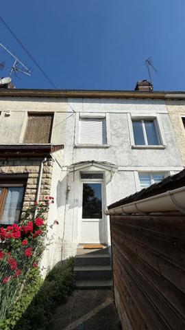 Maison de ville beau potentiel