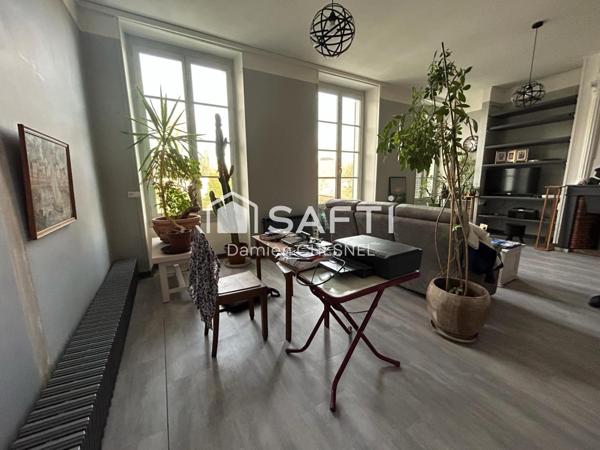 Immeuble  avec appartement 97 m² et grand local commercial – Fort potentiel