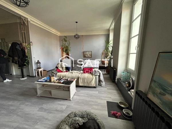 Immeuble  avec appartement 97 m² et grand local commercial – Fort potentiel