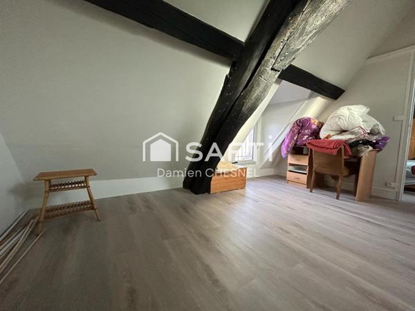 Immeuble  avec appartement 97 m² et grand local commercial – Fort potentiel