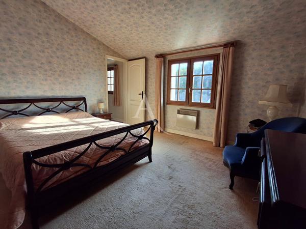 Maison familiale spacieuse dans quartier résidentiel avec commerces