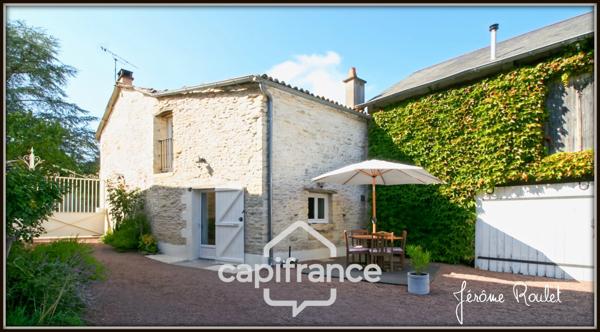 Maison en pierre à vendre 6 pièces 4 chambres terrain 4 700 m² en partie constructible avec dépendances Champigny-En-Rochereau (86)