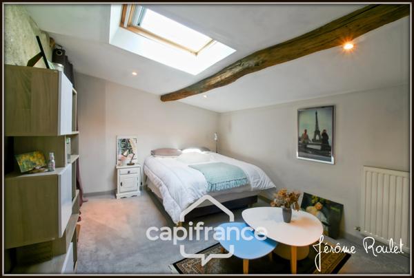 Maison en pierre à vendre 6 pièces 4 chambres terrain 4 700 m² en partie constructible avec dépendances Champigny-En-Rochereau (86)