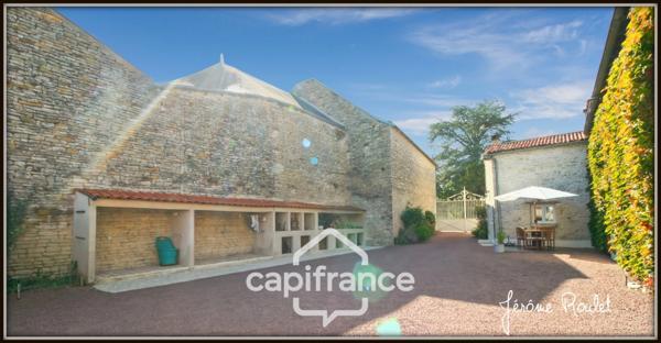 Maison en pierre à vendre 6 pièces 4 chambres terrain 4 700 m² en partie constructible avec dépendances Champigny-En-Rochereau (86)