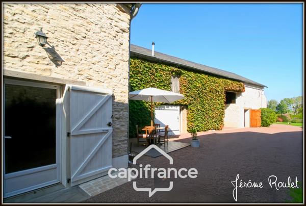 Maison en pierre à vendre 6 pièces 4 chambres terrain 4 700 m² en partie constructible avec dépendances Champigny-En-Rochereau (86)