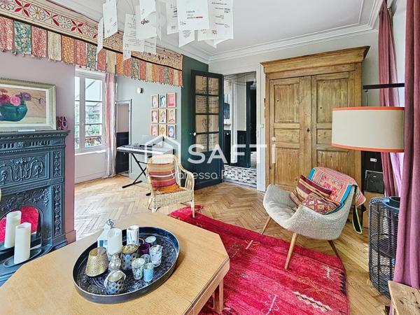 Charme d'une meulière (parquet, moulures, cheminée)