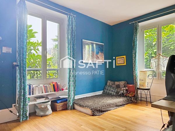 Charme d'une meulière (parquet, moulures, cheminée)