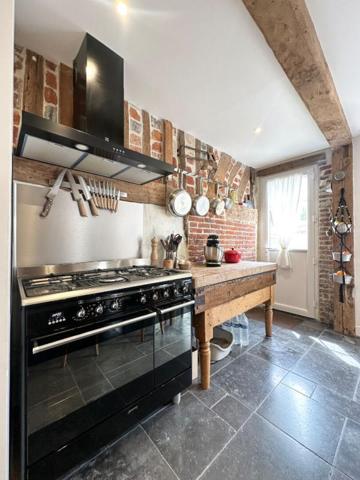 Ensemble de 3 maisons de ville  à pont L'Evêque