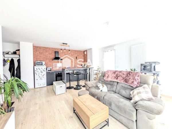 SALES 74150 - appartement T4 avec garage double