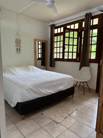 A VENDRE VUE MER SUR POINTE -NOIRE ENSEMBLE IMMOBILER DE 2 APPARTEMENTS DANS GRANDE VILLA ET UN BUNGALOW SUR 810 M² DE TERRAIN